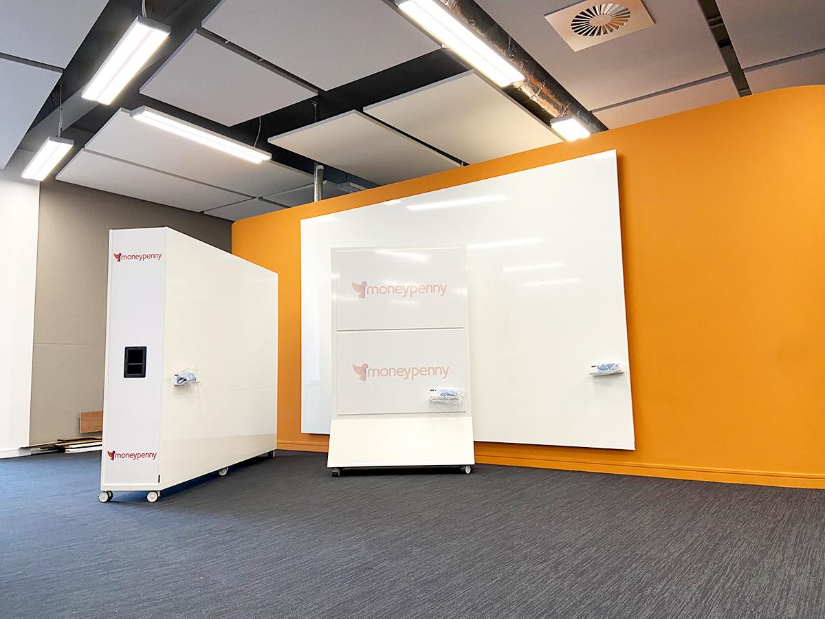 Collaborative whiteboards range with divider, freestanding board and wallmounted for Moneypenny