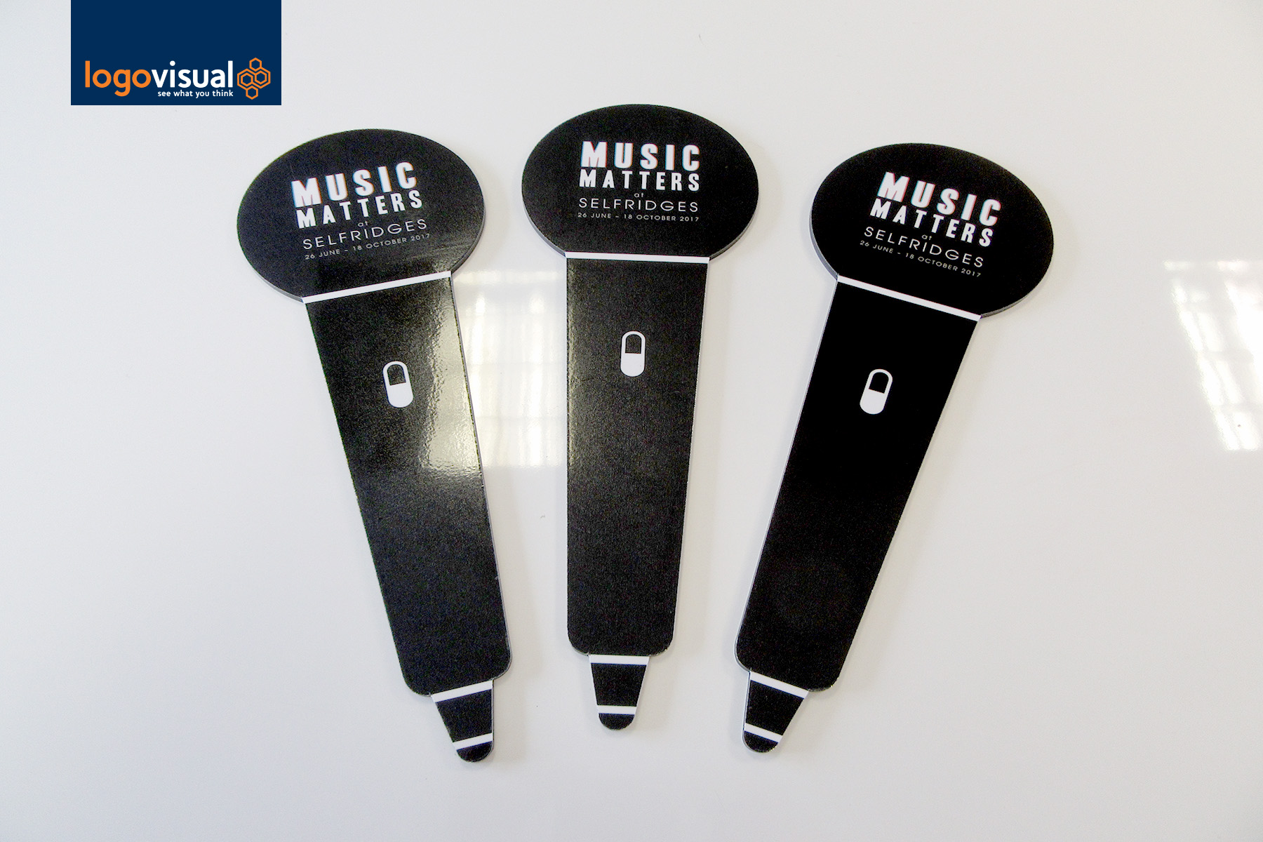 Custom black microphone shaped whiteboards for Music Matters at Selfridges