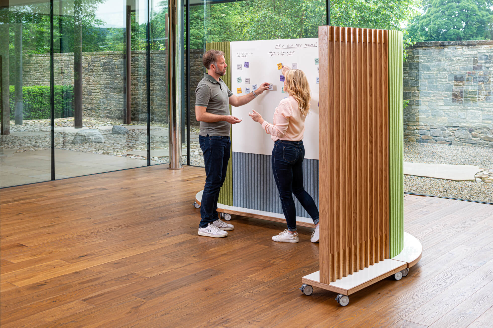 ThinkingWall Mobile Slatted Screen works as a semi private divider