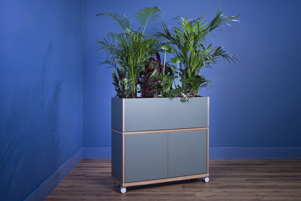 Acoustic planter with storage cupboard